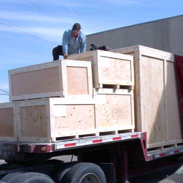 loading crates on truck